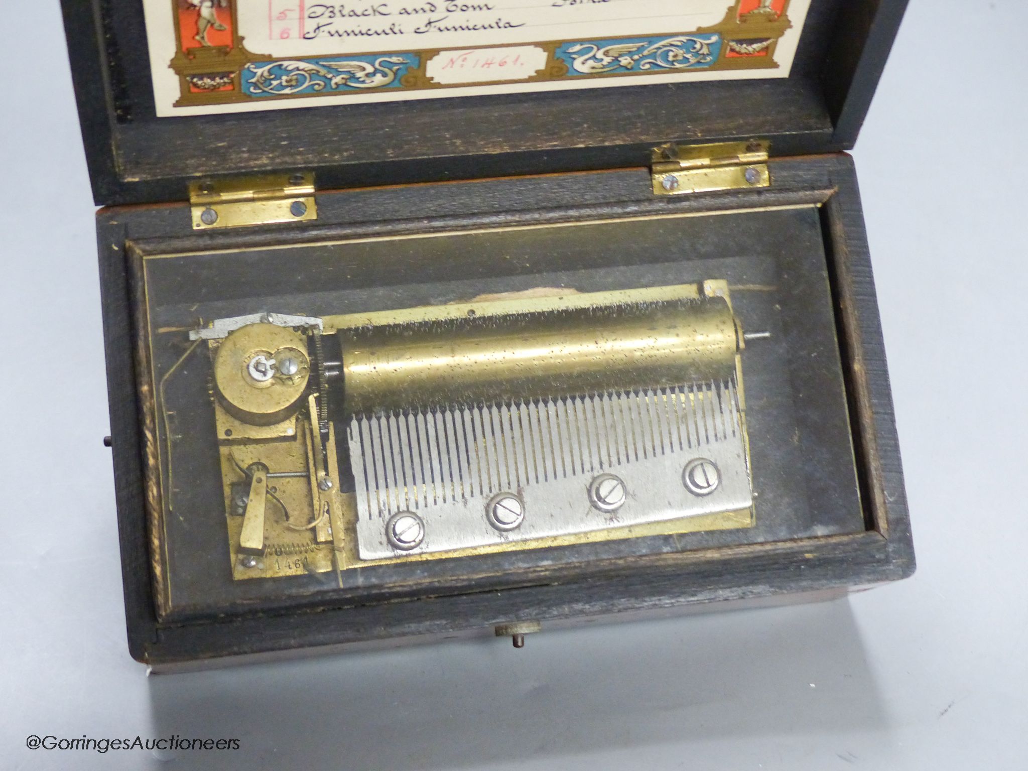 A small Swiss amboyna six air cylinder musical box